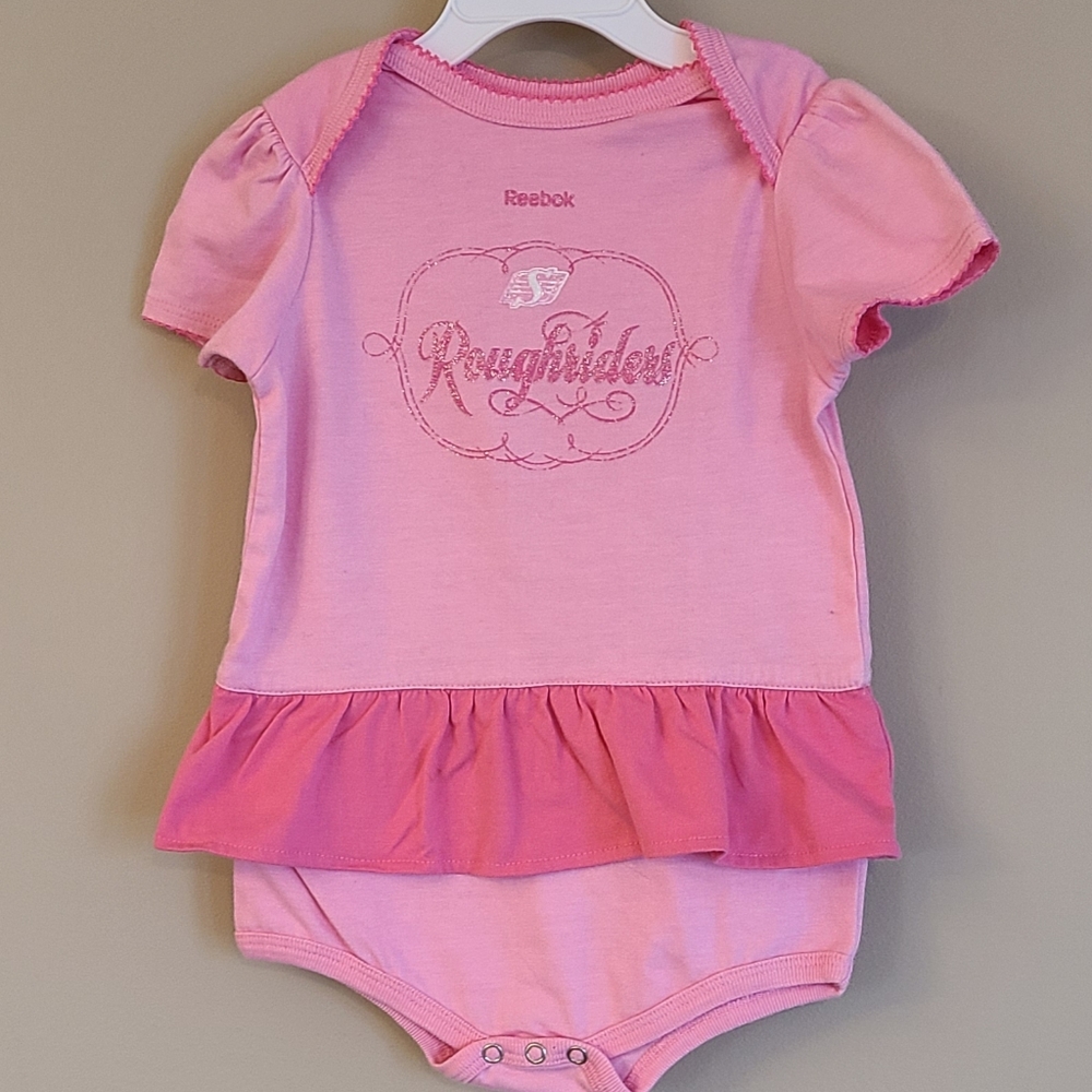 Reebok Saskatchewan Roughriders pink short sleeved onesie/bodysuit